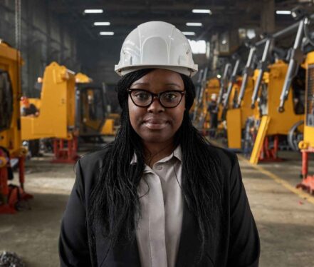 businesswoman-in-work-helmet-working-in-plant-2026-01-08-00-15-17-utc